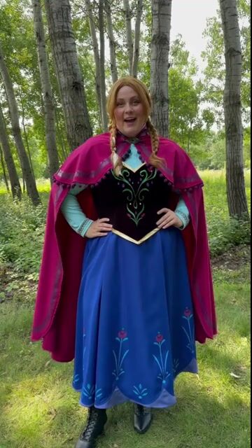 Step into the magical world of Arendelle with this exclusive Women's Plus Size Premium Disney Frozen Anna Costume! This exquisite outfit brings Anna to life with stunning detail, perfect for any Frozen fan.
