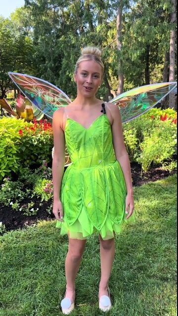 Transform into the iconic pixie with this exclusive Women's Disney Tinker Bell Costume! With its vibrant green dress and delicate wings, you'll be ready to sprinkle some fairy dust wherever you go.