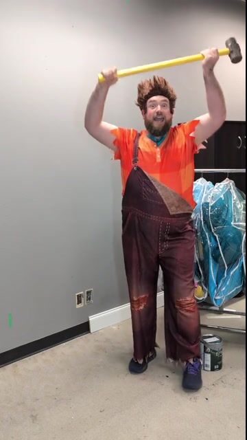 Step into the pixelated world of arcade heroics with this officially licensed Men's Plus Size Wreck It Ralph Costume. Comfortable and bold, it's ideal for Disney lovers looking to make a big impression.