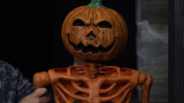 SNW83175ROY2UCE-0 5FT Orange Skeleton with Pumpkin Head