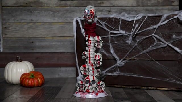 FY94198 22 Skull Pillar with Light Up Eyes Halloween Decoration