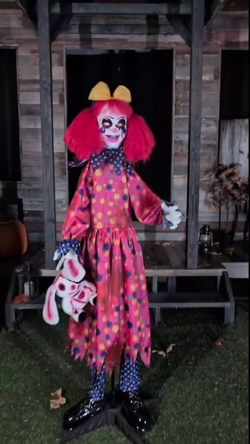 Meet Gabby the Grisly Clown—she may wear a smile, but don’t let that fool you. Standing over 5 feet tall, Gabby clutches a nightmarish bunny toy and springs to life with sinister movement and spine-chilling sounds that make her a standout in any haunted setup.